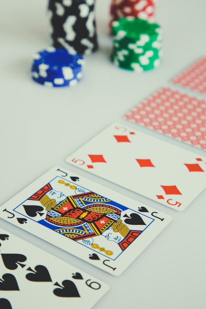 Photo by Markus Spiske assorted playing cards on white surface