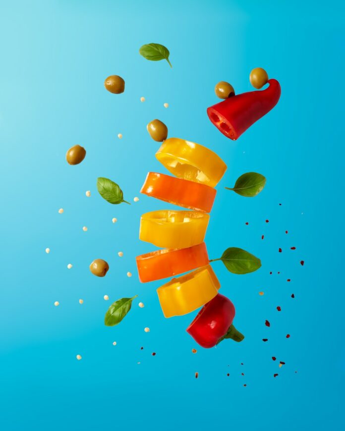 Photo by Tangerine Newt a group of objects floating in the air