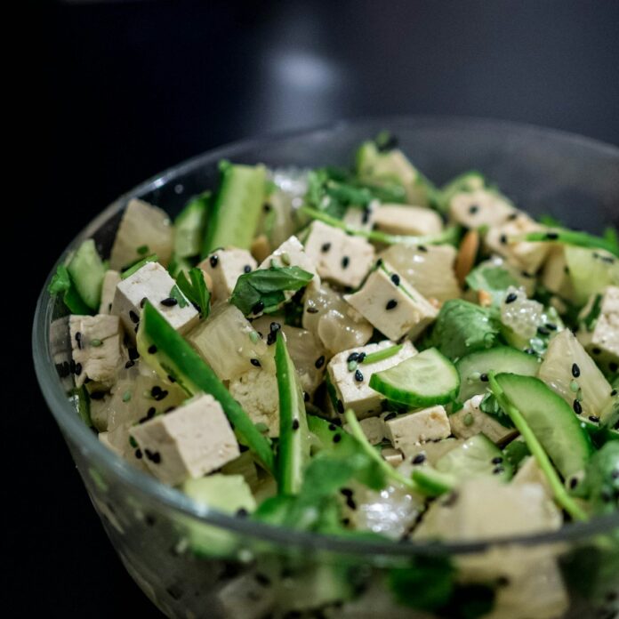 Photo by Yoav Aziz sliced of vegetables in clear glass bowl