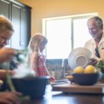 “슬로우 라이프” 열풍, 일상 속 작은 변화로 건강 지키기 Grandfather and grandchildren prepare food in kitchen