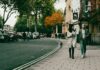 “일상 속 작은 변화, 직장인 건강을 지킨다” a couple of people walking down a street