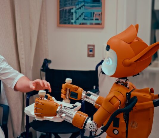 AI, 건강 관리를 바꾸다…집에서도 똑똑하게 실천하는 내 몸 지키기 Man gives robot bottles on a tray